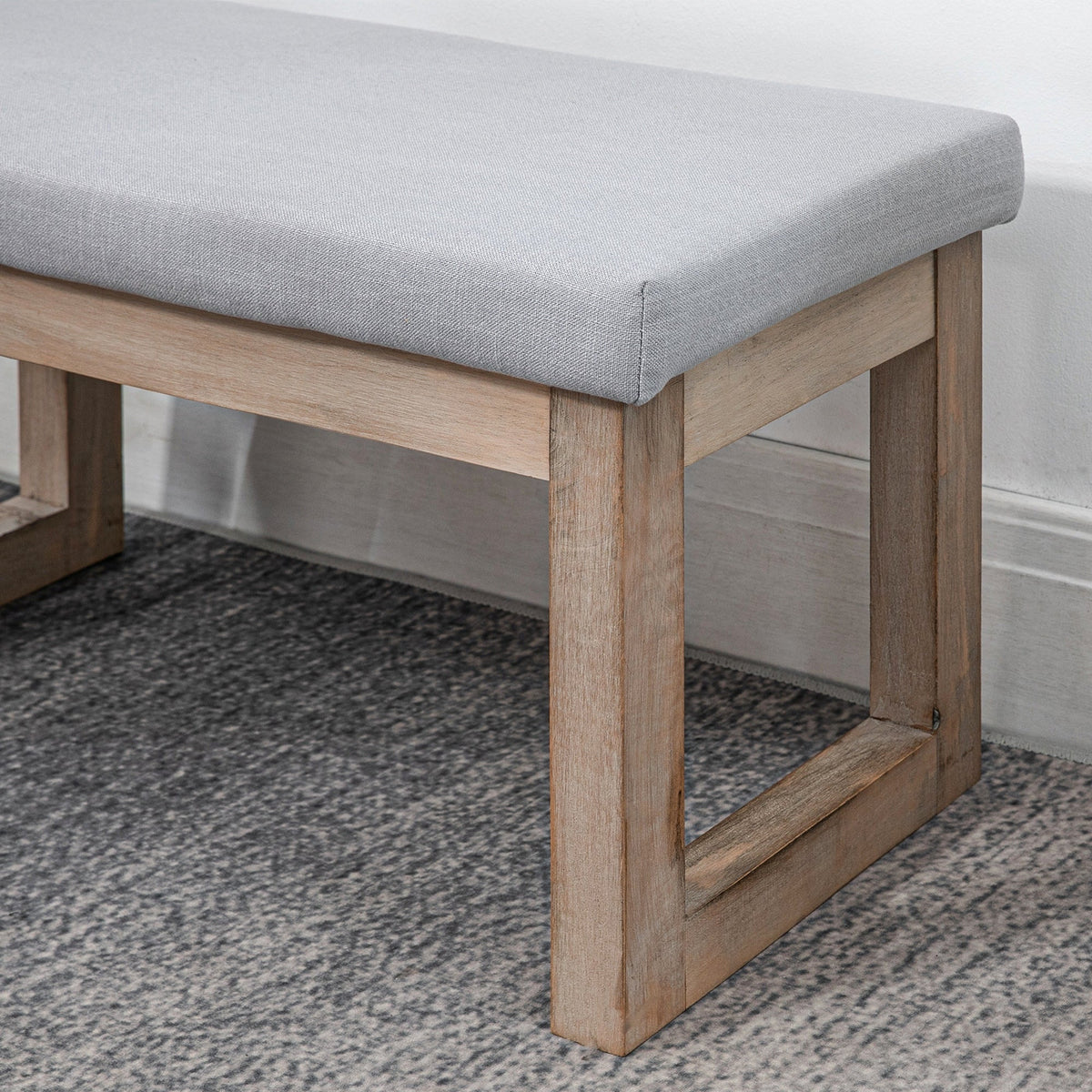 Footstool upholstered with wooden legs, 68x38x42 cm, grey