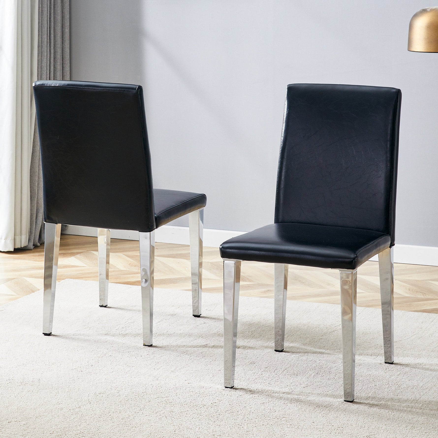 Minimalist Dining Chairs Set of 2, Ergonomic PU Leather and Metal, Black and Silver