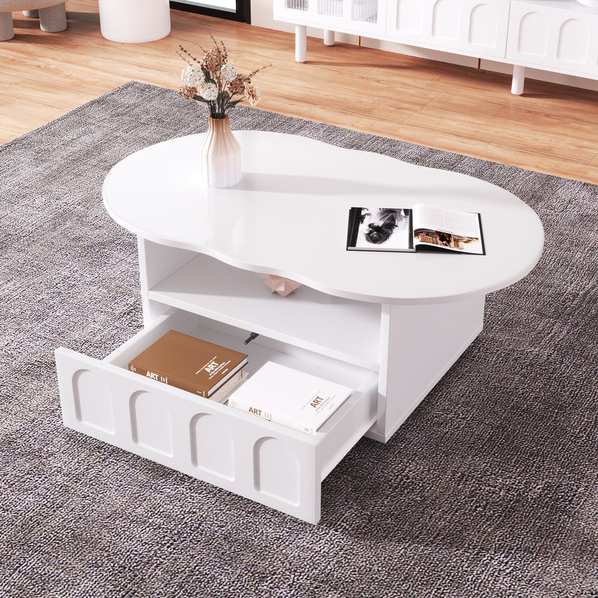 Coffee table, cloud-shaped with drawers and storage compartments